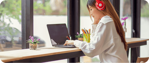 alt text - girl at desk