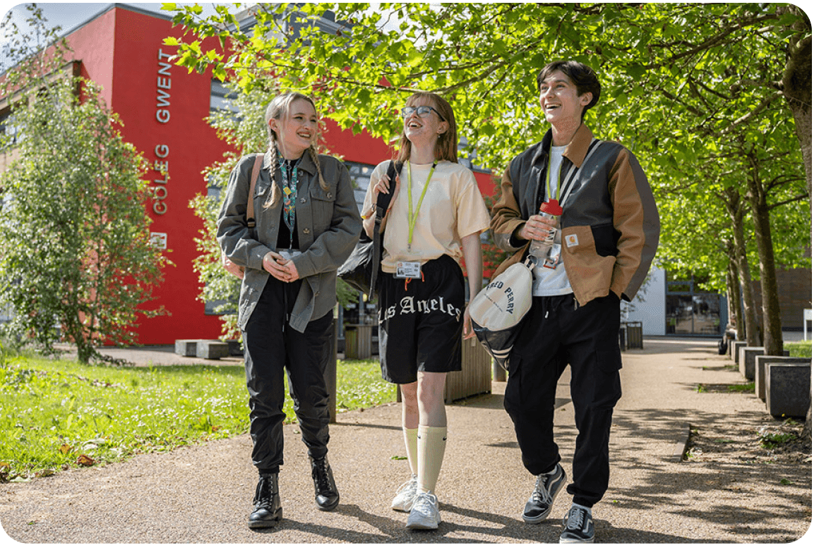 Coleg Gwent learners walking outside on campus